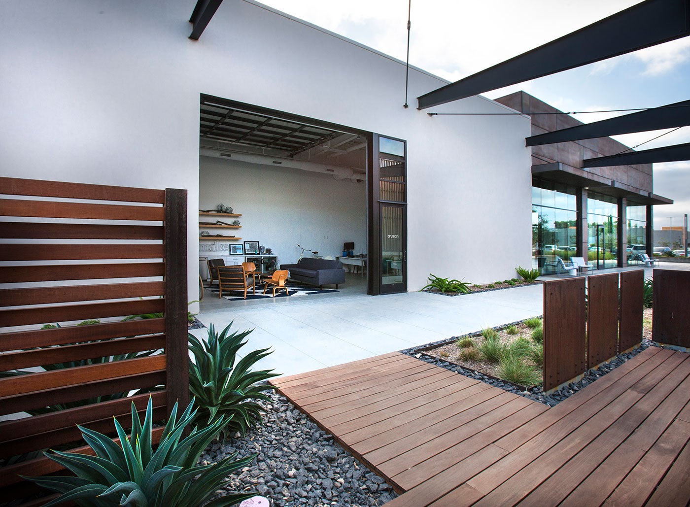 <strong>MAKE: CARLSBAD, CALIFORNIA |</strong> Multiple buildings (some of them formed from shipping containers) unite to form a campus that serves several small businesses