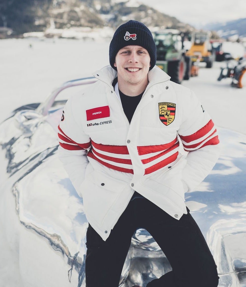 <span>Ferdi Porsche sits atop a reflective “fat car” sculpture by Austrian artist Erwin Wurm at the 2022 GP Ice Race </span><br/><span class="caption-sub"><em>Photo credit: Amy Shore</em></span>